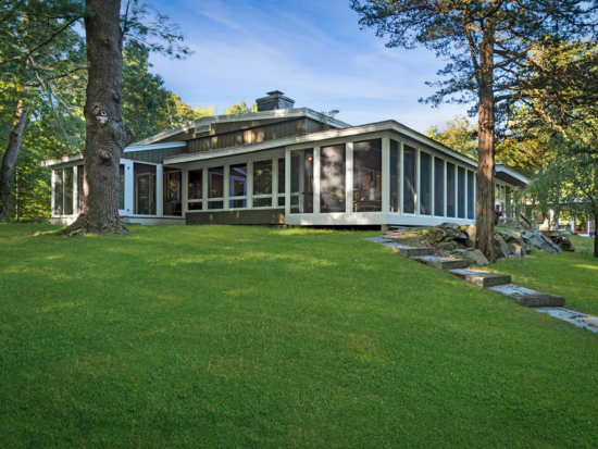 Built in 1952, this mid-century modern home at 443 Middle St. in West Newbury has three bedrooms, one full bath, three half baths, and a list price of $1,900,000. Photo by Dan. St. John, Lightshed Photography Studio.