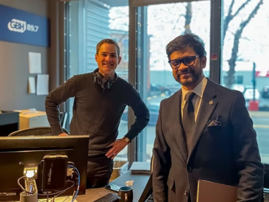 BAC President Mahesh Daas and Jared Bowen wait to record an episode of The Culture Show in a GBH recording booth.