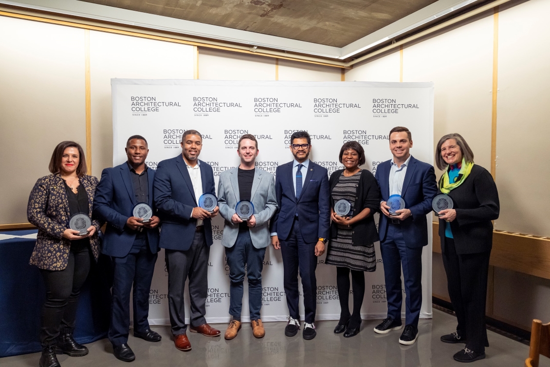 Alumni Winners from L to R: Jessica Haley (MID'12), Marcos Severino (B.Arch'18), Jonathan Garland (B.Arch'09), Michael McCullough(MDS-SD'16), President Mahesh Daas, Elizabeth Luc Clowes (MLA'19, Cert'14), Joshua Barnett (B.Arch'13), and Karen Nelson, Dean of the BAC School of Architecture.