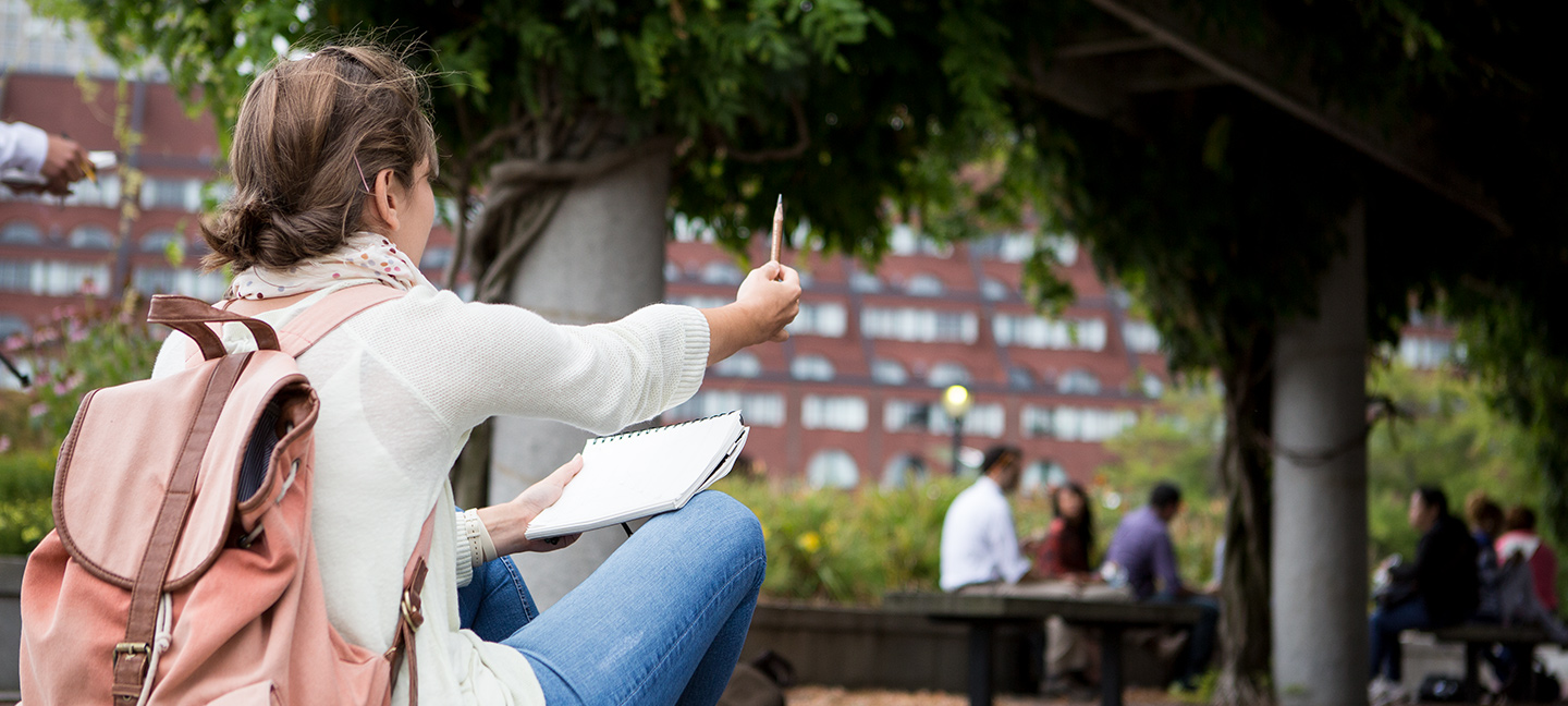 girl drawing at the park