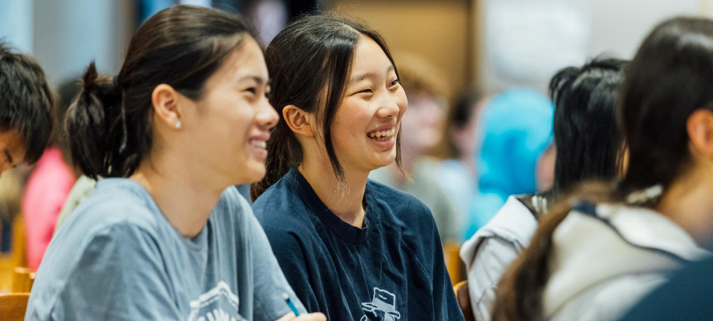 Urban Design and Planning Studio students smile as they engage during a lecture.