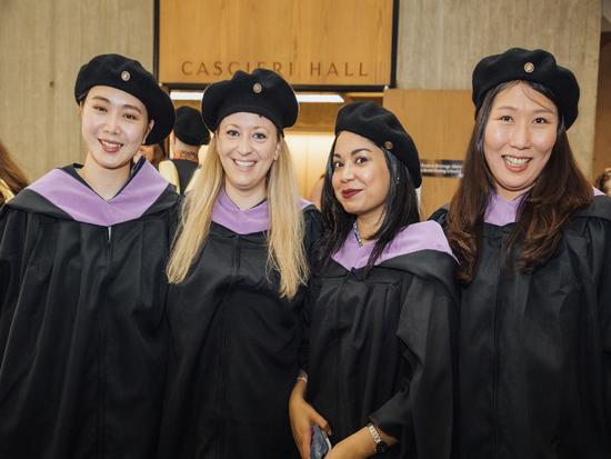 A group of four female friends at Commencement 2022