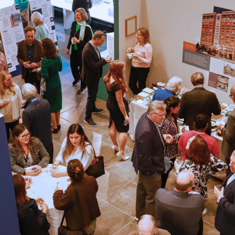 BAC community members enjoy talking during a reception in the BAC McCormick Gallery.