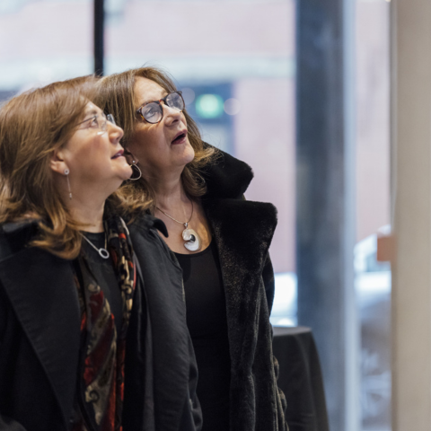 Visitors check out the 2025 Graduate Exhibit in the BAC McCormick Gallery.