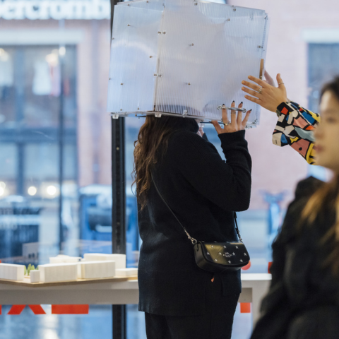 Visitors participate in an interactive part of 2025 Graduate Exhibit in the BAC McCormick Gallery.
