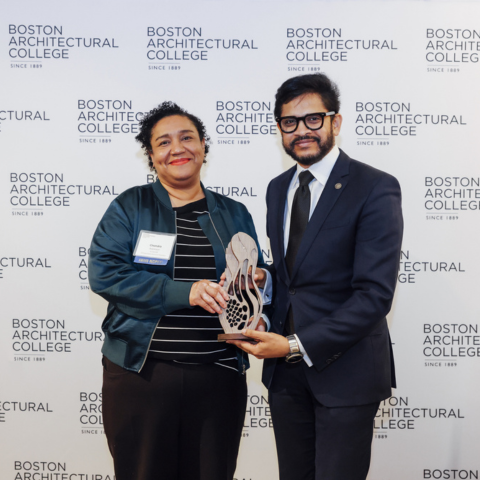 Chandra D. Robinson, M.Arch'08, AIA NOMA, accepts a Distinguished Alumni in Practice Award from President Mahesh Daas at the 2026 Alumni and Friends Awards' Ceremony.