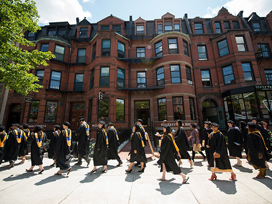 Students walk during Commencement