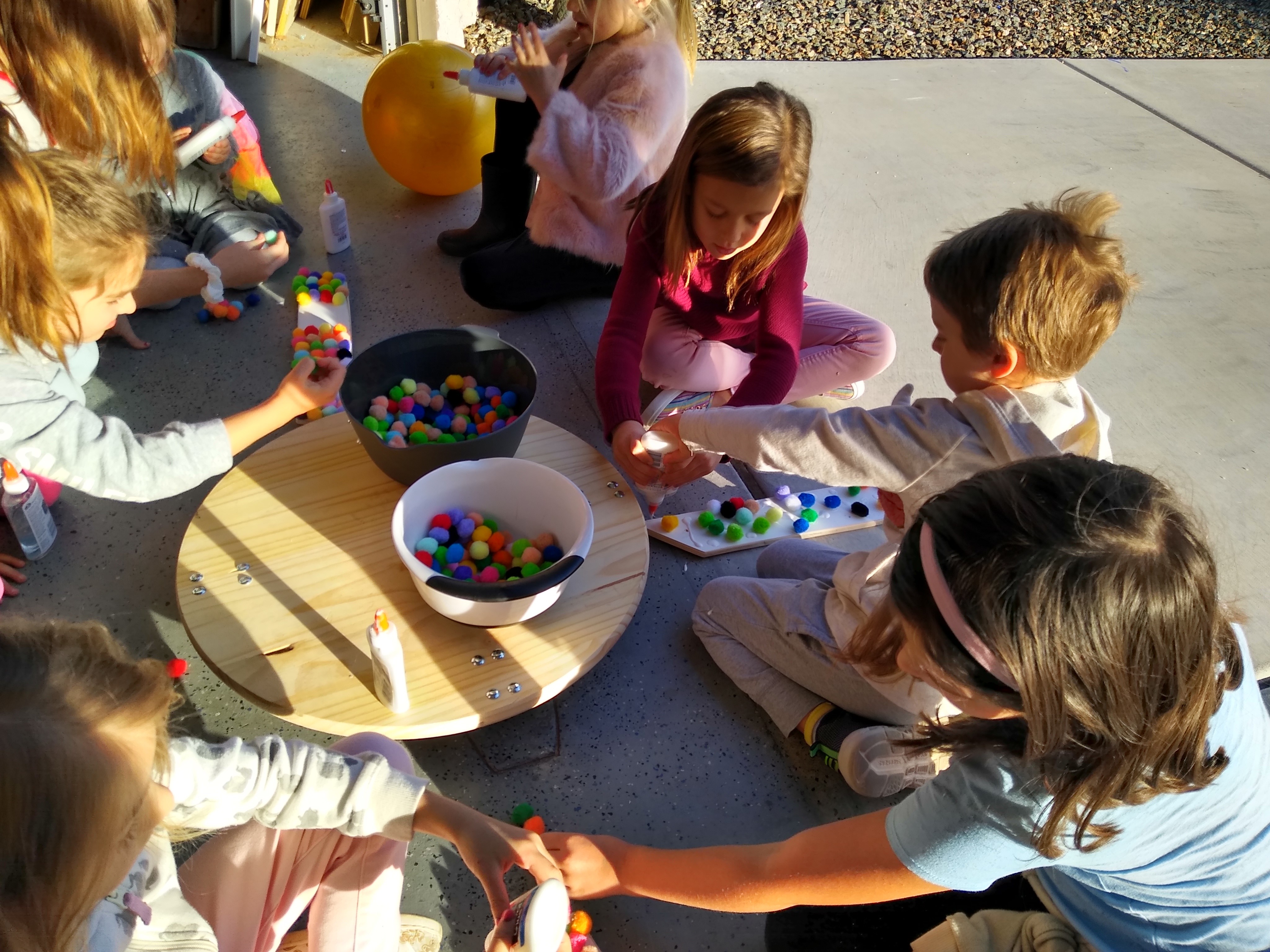 kids playing wool balls