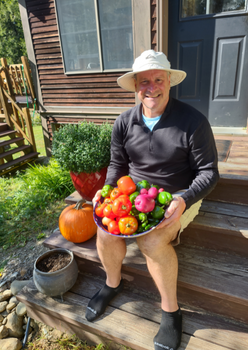 David Wilkins holds some newly harvested and cleaned vegetables for the November 11th Foundation's first VA donation.