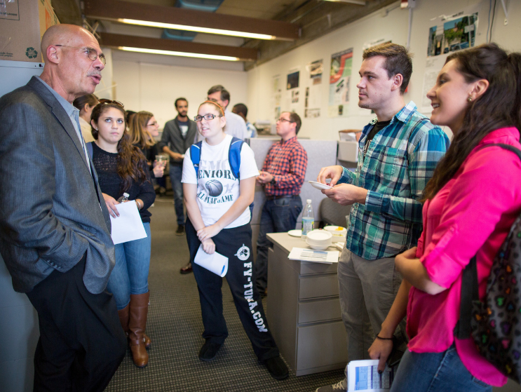 Len Charney speaks with students at a Practice Open House during his tenure as the Dean of Practice at the BAC.