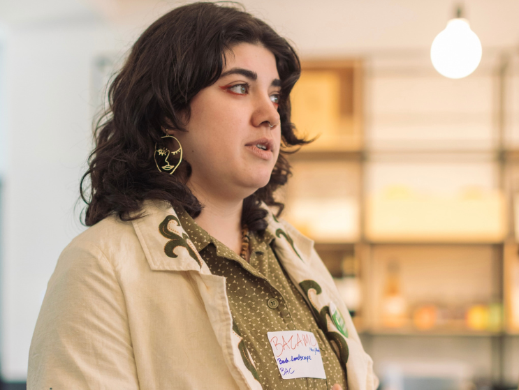 Bazam, BLA'27, gives a presentation.