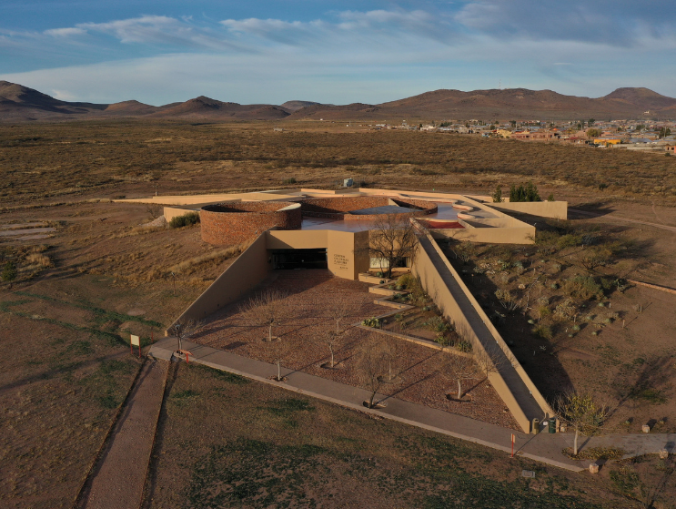 The Museum of Northern Cultures, Paquim&eacute; sits within an arid landscape, where low earth-toned forms and courtyards reflect the desert environment.
