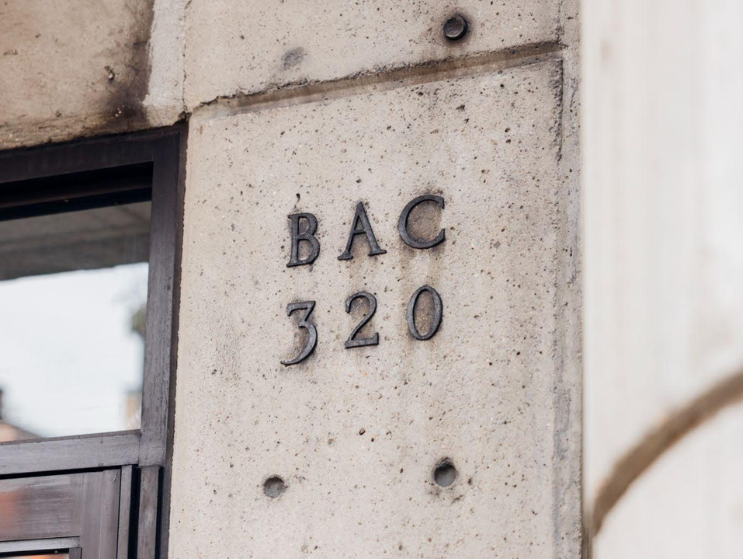 Original "BAC 320" lettering mounted on the exterior fa&ccedil;ade of 320 Newbury Street, home of the Boston Architectural College.