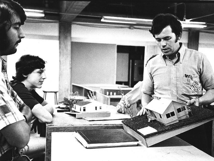 Don Brown reviews architectural models with students at the Boston Architectural College during a studio session in the 1970s.